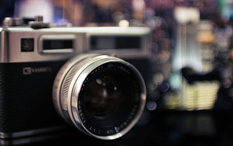 close-up photo of gray and black camera thumbnail