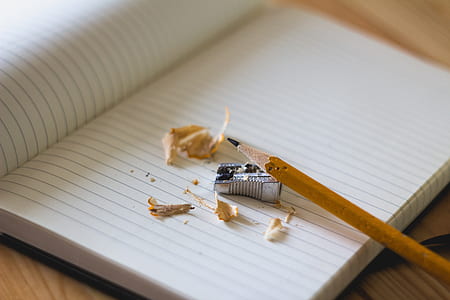 pencil with gray sharpener on notepad thumbnail