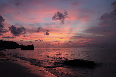 landsca[e photo of sea shore during golden hour thumbnail