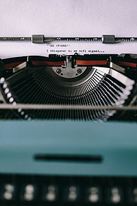 Closeup view of typing quotes on the old typewriter thumbnail