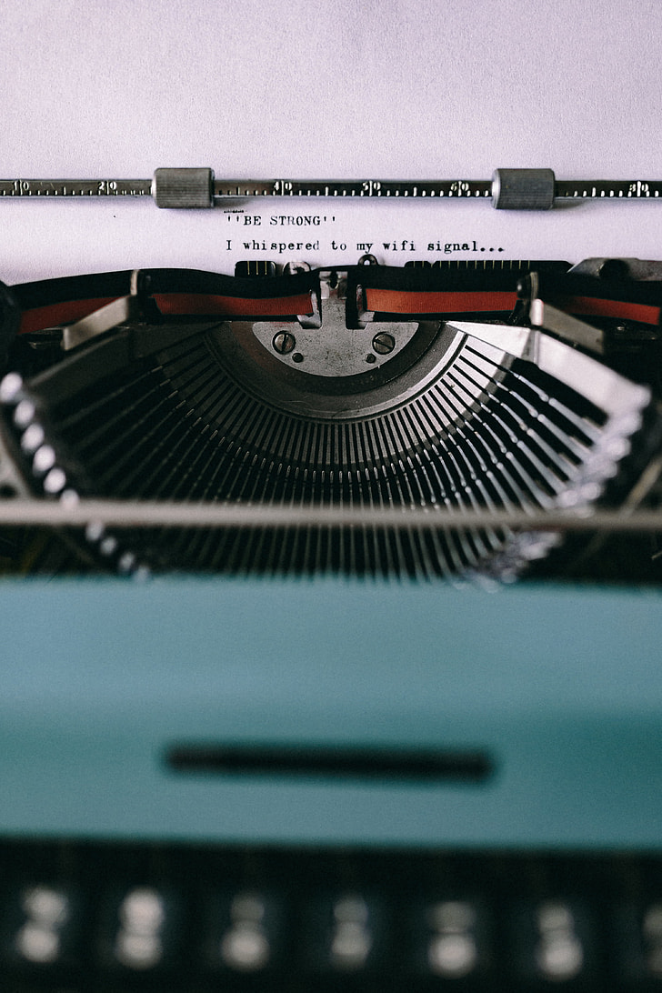 Closeup view of typing quotes on the old typewriter