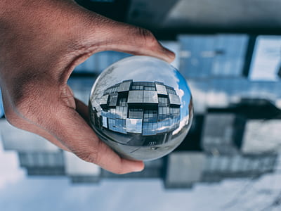 person holding clear ball thumbnail