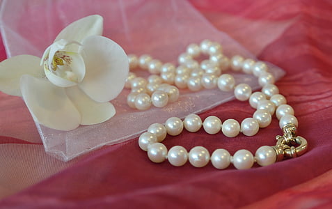 white pearl beaded necklace and white petal flower thumbnail