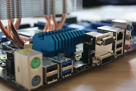 selective focus photography of blue and gray motherboard thumbnail