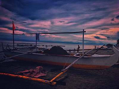 White Fishing Boat during Dawn thumbnail