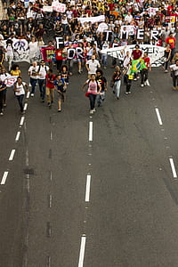 group of people protest during day time thumbnail