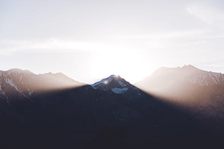 mountain covered with snow during daytime thumbnail