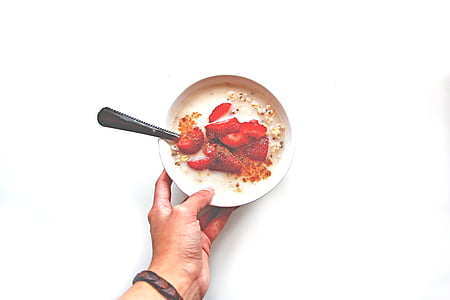 person holding bowl of dessert thumbnail