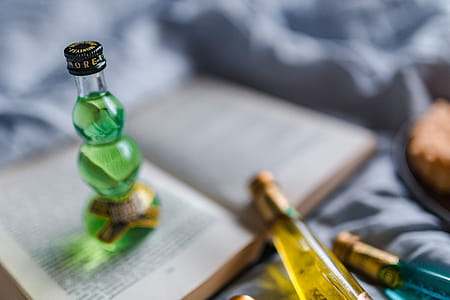 Group of colorful little bottles with liqueurs thumbnail