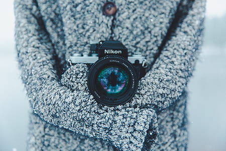 black and silver Nikon camera thumbnail