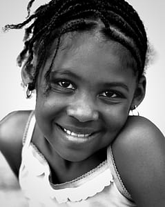 grayscale photo of a girl in spaghetti-strap top thumbnail