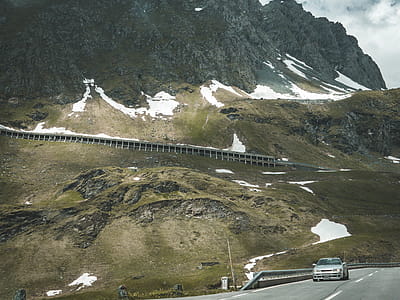 Silver Car on Road Near Mountain at Daytime thumbnail