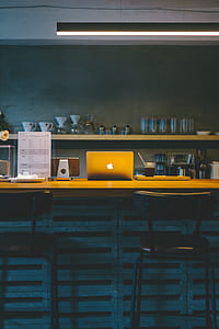 silver MacBook on desk thumbnail