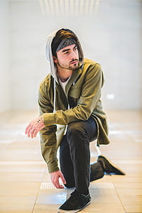 man right knee kneeling on floor thumbnail