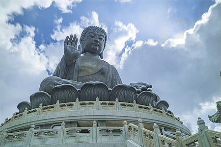 low angle photography of meditating Buddah thumbnail