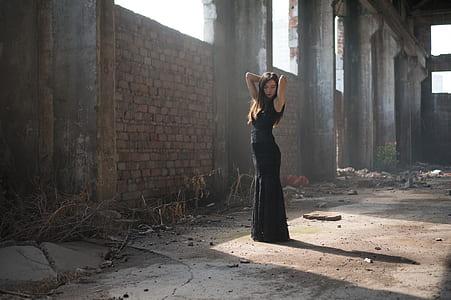 woman wearing black sleeveless mermaid dress thumbnail