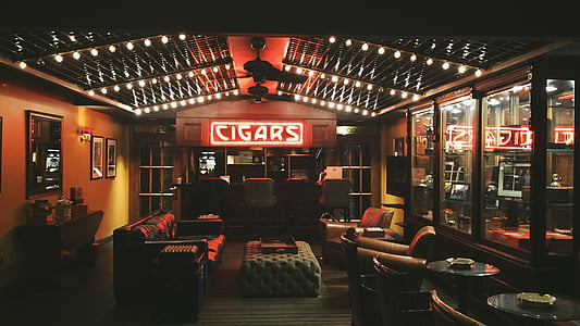 red Cigar neon light turned on in living room thumbnail