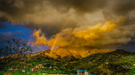 mountain under cloudy sky thumbnail