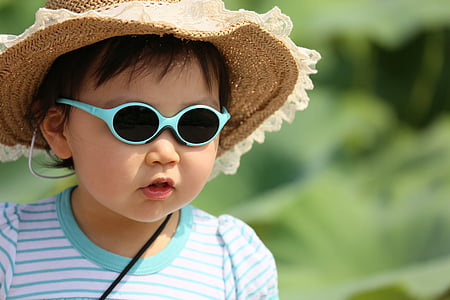 girl wearing stripe shirt, sunglasses selected photograghpy thumbnail