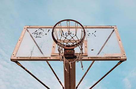 low angle photography of portable basketball hoop during day time thumbnail