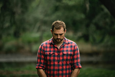 man in red and black gingham button-up long-sleeved shirt thumbnail