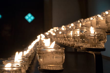 closed-up photography of lighted candles thumbnail