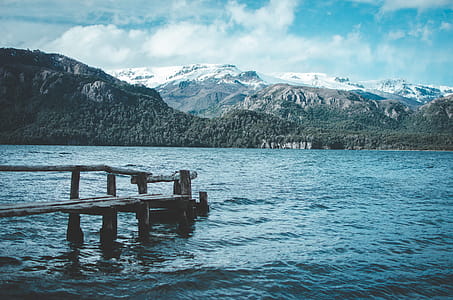 Brown Wooden Dock on Body of Water thumbnail