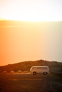 white van beside fence thumbnail