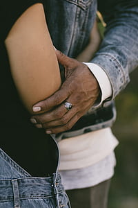 shallow focus photo of two person hugging thumbnail