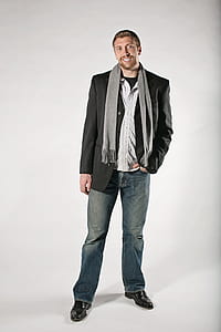 photo of man in black suit jacket thumbnail