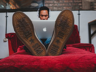 person using MacBook laptop thumbnail