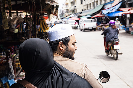 man and woman riding motorcycle at daytime thumbnail