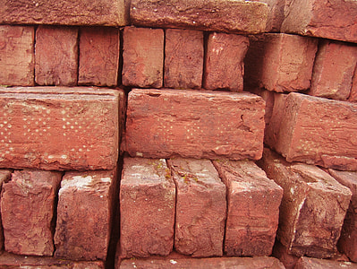 stacked brown bricks close-up photography thumbnail