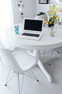 Workplace with laptop on table at home thumbnail