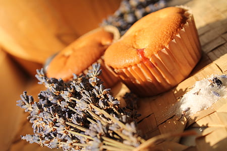 two cupcakes on brown wicker surface thumbnail
