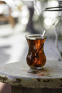 tea in clear glass drinking cup thumbnail