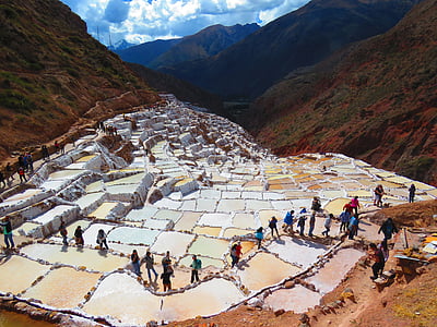 person walking near mountain at daytime thumbnail