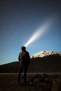 man standing in front mountain thumbnail