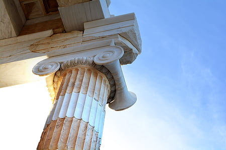 low-angle photo of beige concrete column thumbnail
