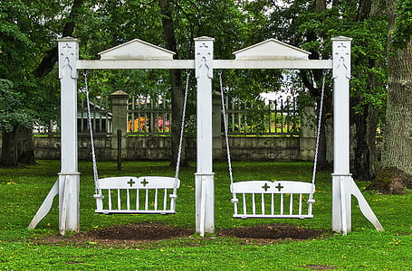 two white wooden bench swings thumbnail