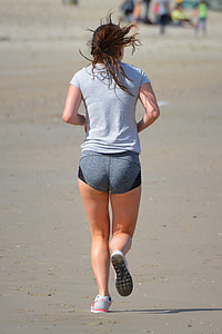 woman running on gray pavement thumbnail