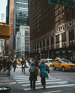 woman walking across pedestrial lane thumbnail