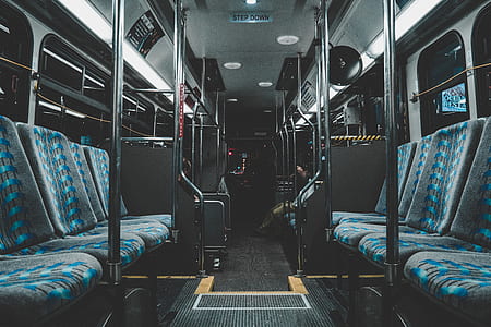 empty train interior with blue seats thumbnail