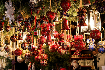 photo of Christmas tree hanging ornaments thumbnail