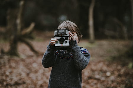 child taking picture thumbnail