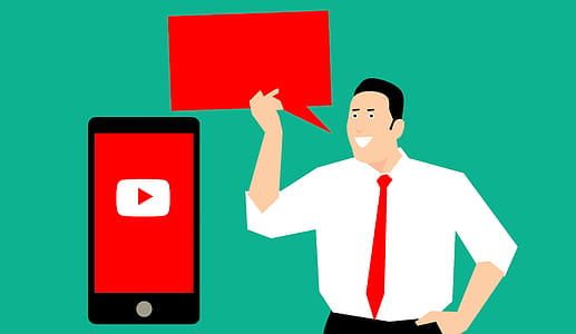 Marketing man talking - empty speech bubble - about social media marketing with mobile device. thumbnail
