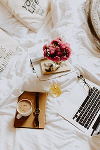 Morning coffee in bed. Working in bed thumbnail