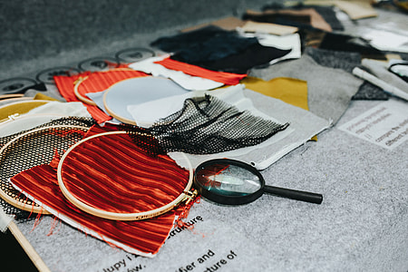 Magnifying glass with fabric on a table thumbnail