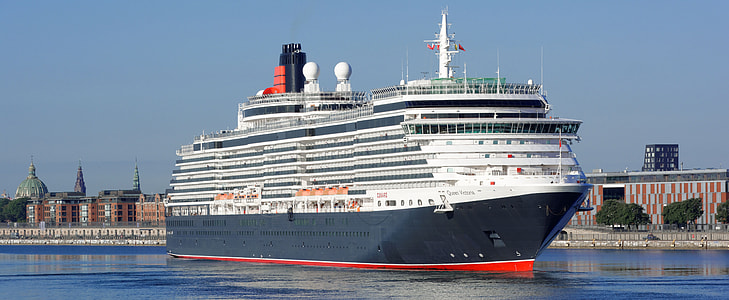 white cruise ship on body of water during daytime thumbnail