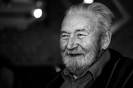grayscale photo of man wearing polo shirt thumbnail